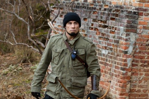 John Travolta as Bosnian War vet Emil Kovac in the upcoming 'Killing Season,' which he stars in opposite Robert DeNiro. 'Killing Season' hits theaters July 12.