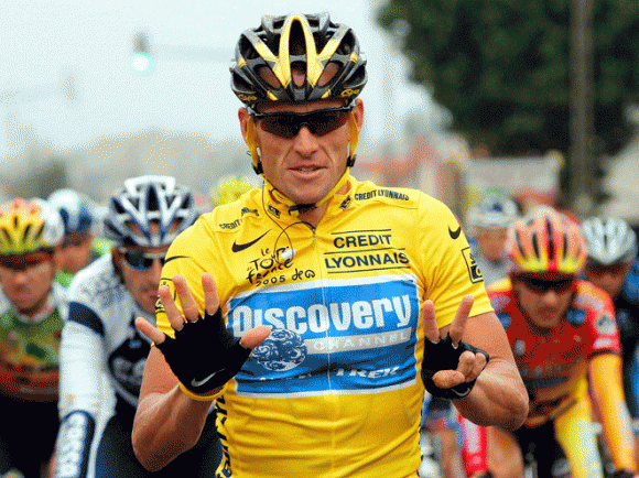 Lance Armstrong, on the final stage of his seventh and final Tour de France victory. He has since been stripped of all wins and banned from professional cycling.