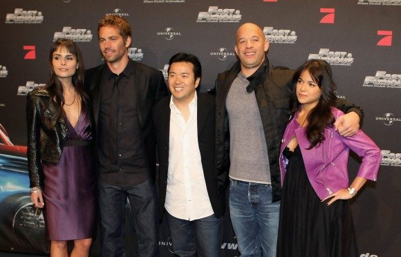 Justin Lin (center) with the cast of 'Fast & Furious'