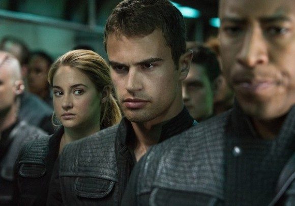 Theo James as Four with Shailene Woodley as Tris looking over his shoulder