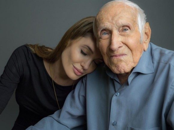 Director Angelina Jolie and the real Louis Zamperini, who passed away earlier this year