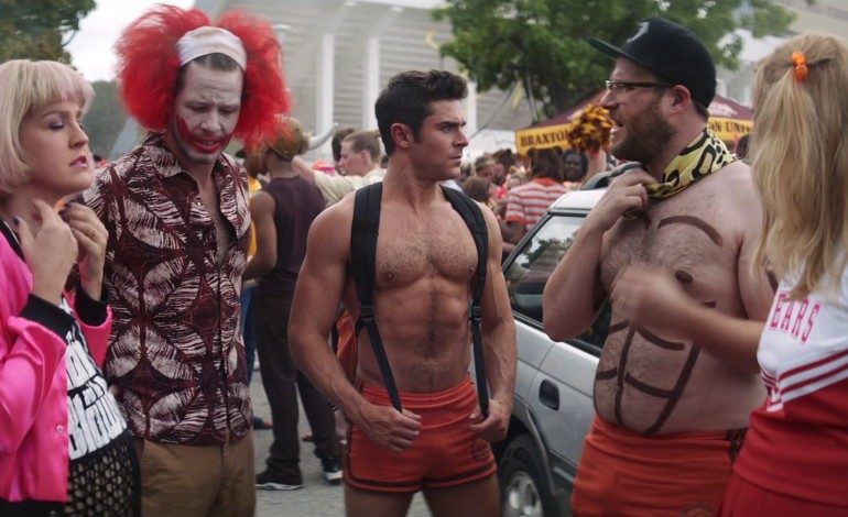 New Poster For ‘Neighbors 2: Sorority Rising’ Shows Rogen And Moretz Facing Off