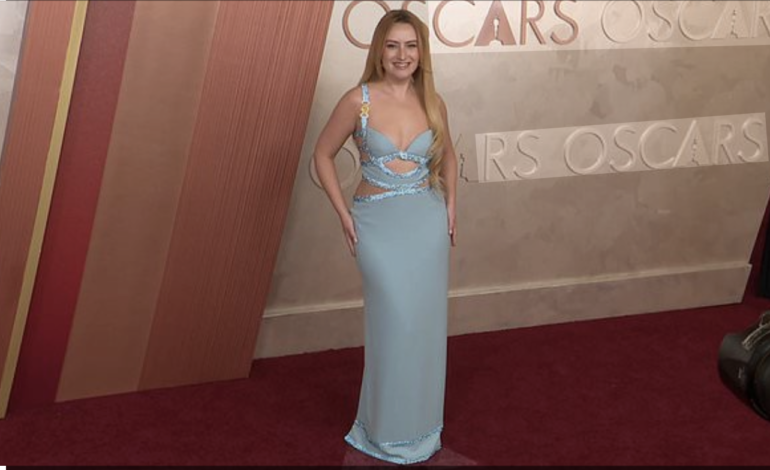 ‘Chicken Shop Date’ Host, Amelia Dimoldenberg Returns To Oscars Red Carpet