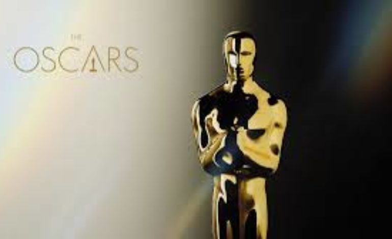 ‘The Singers’ And ‘Two People Exchanging Saliva’ Tie For Best Live Action Short